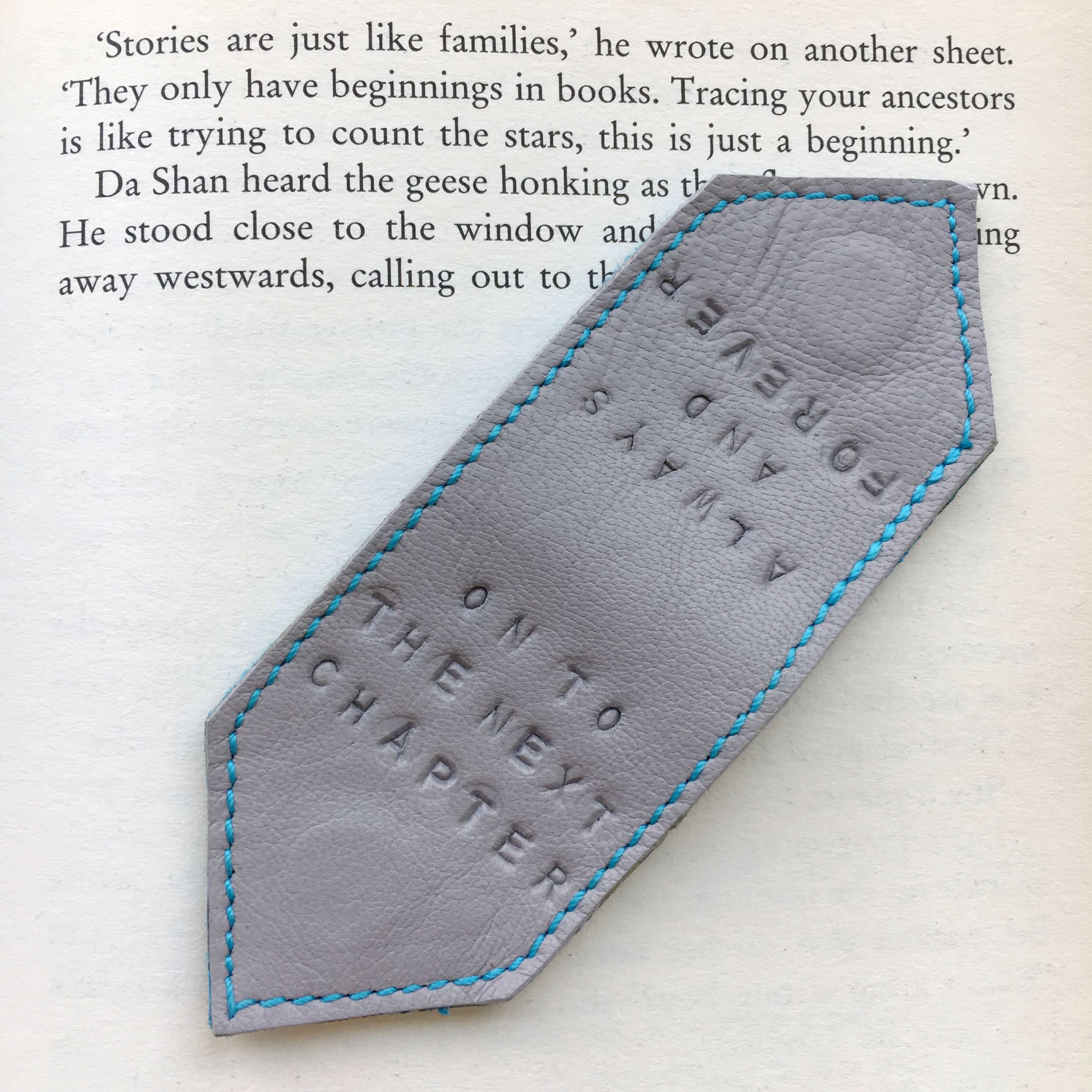 personalised_grey_leather_bookmark_by_Law