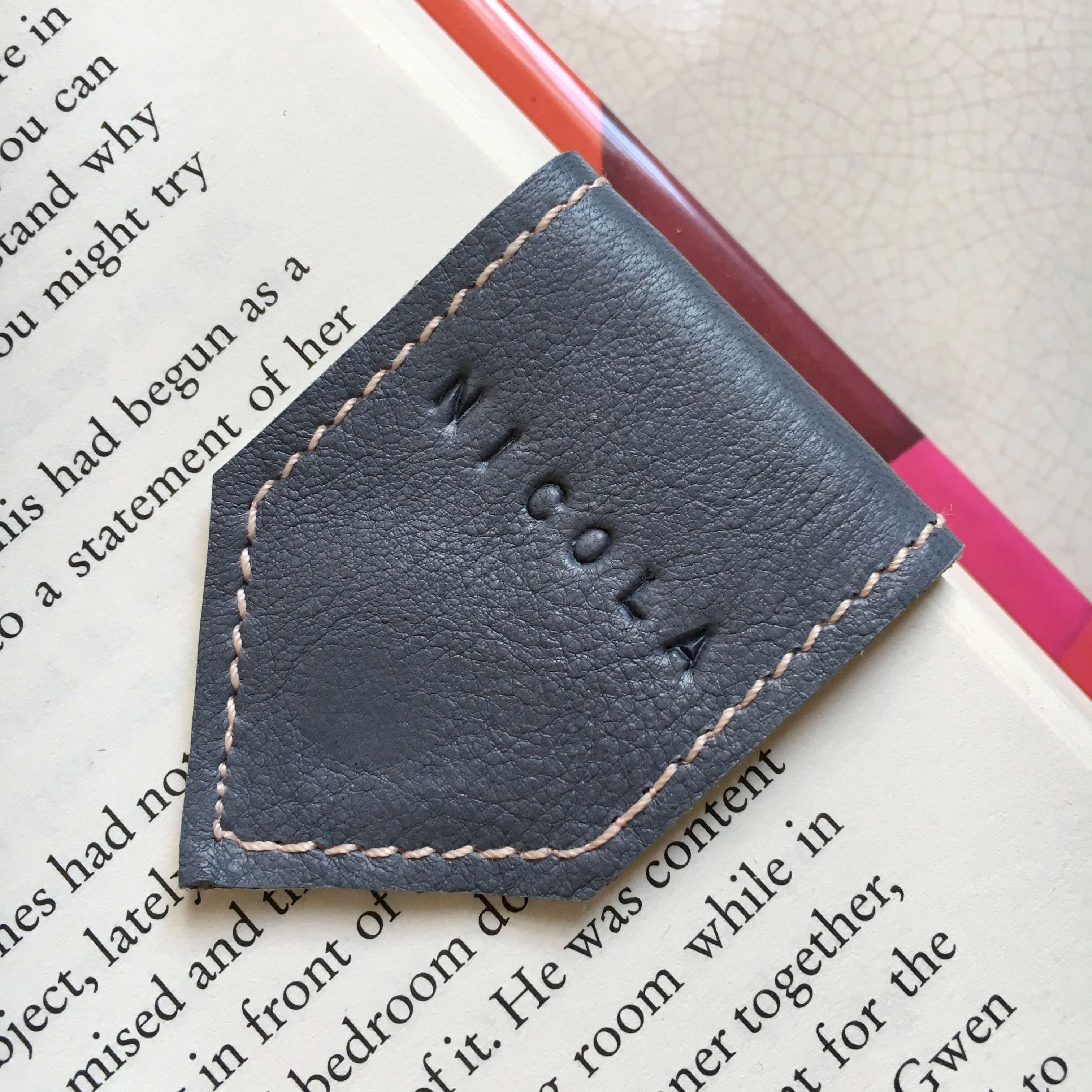 personalised_grey_leather_bookmark_by_law