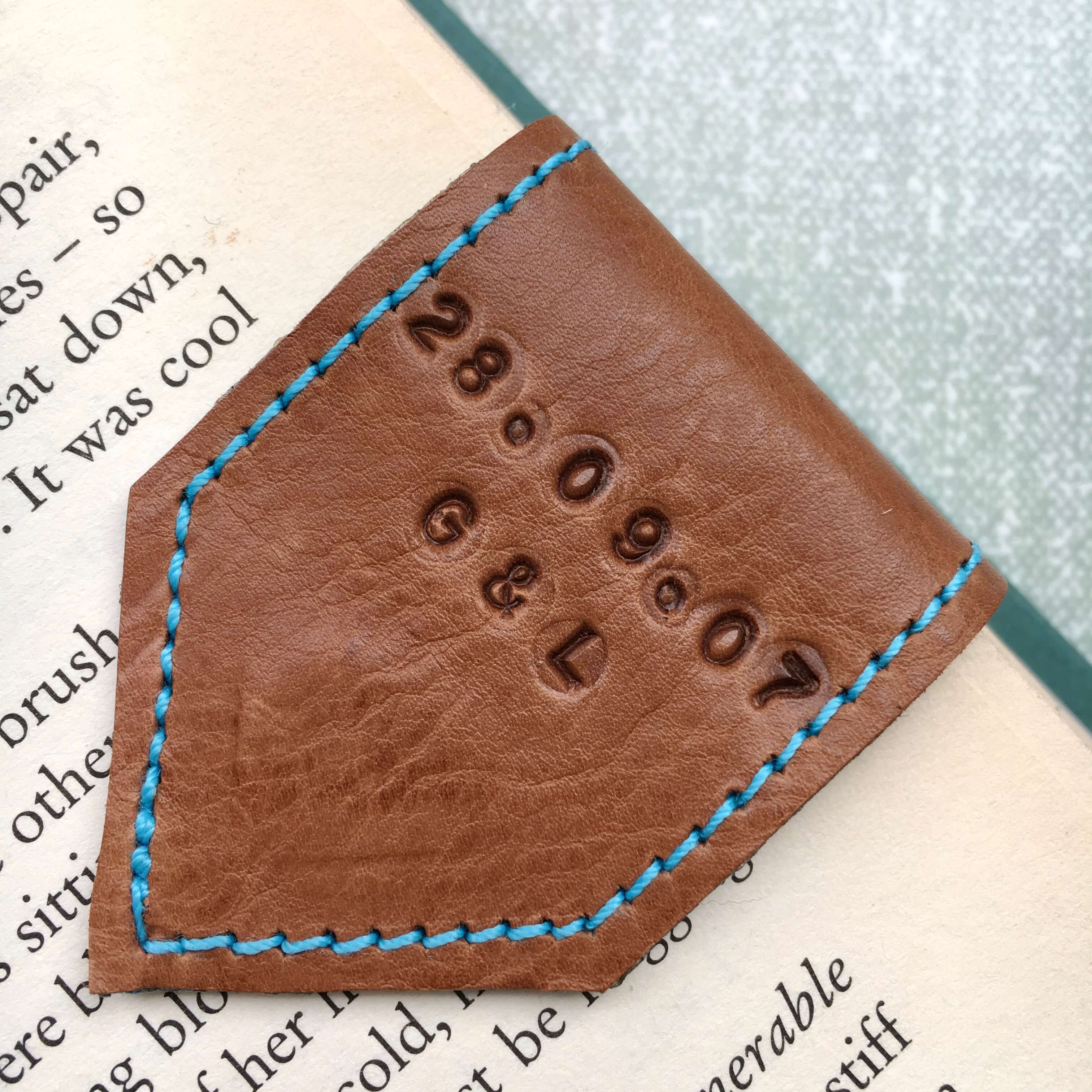 personalised_tan_leather_bookmark_by_Law